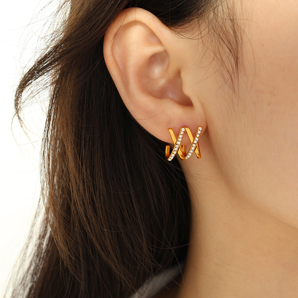 Nira Crystal Claw Studs