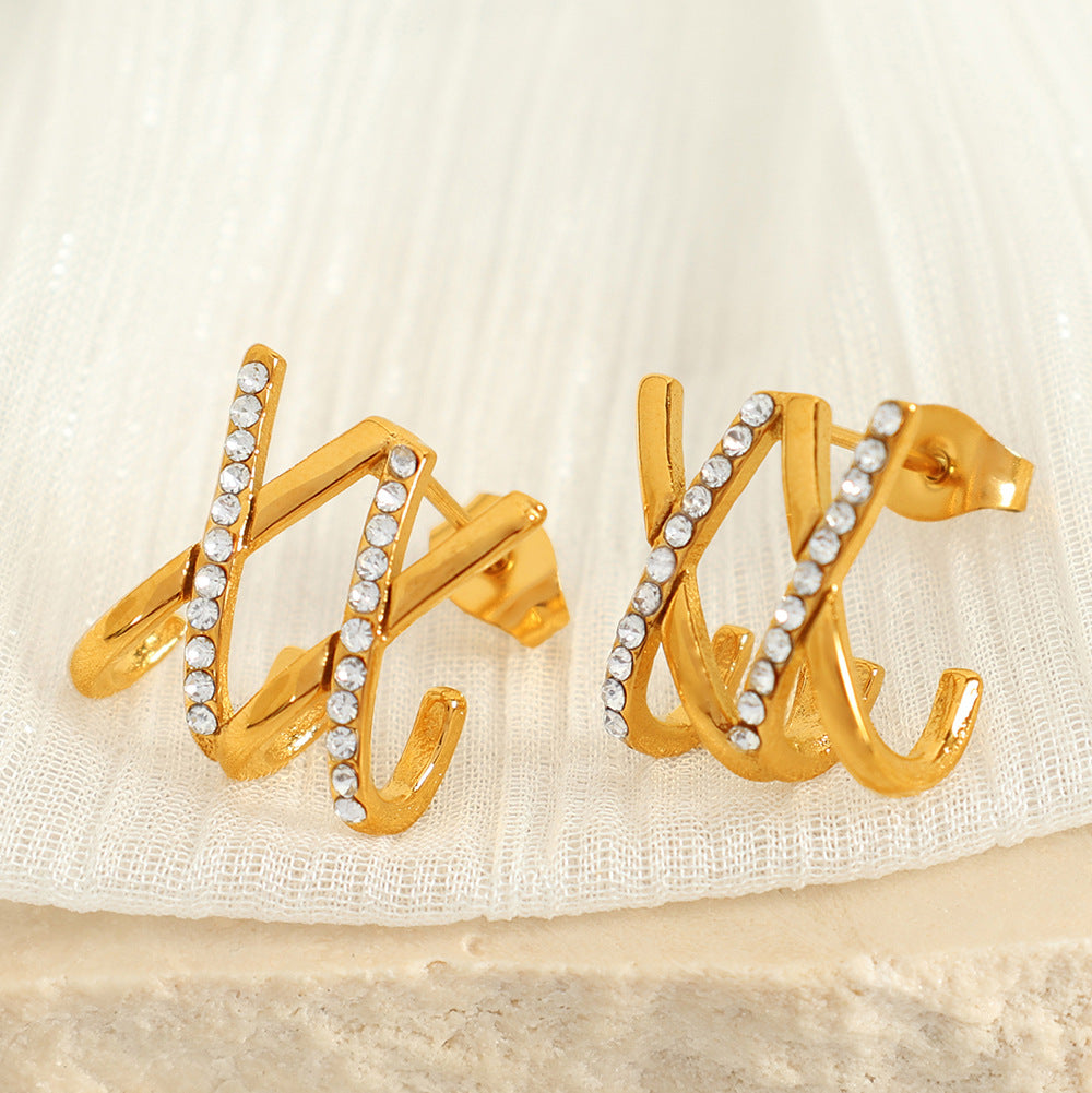 Nira Crystal Claw Studs