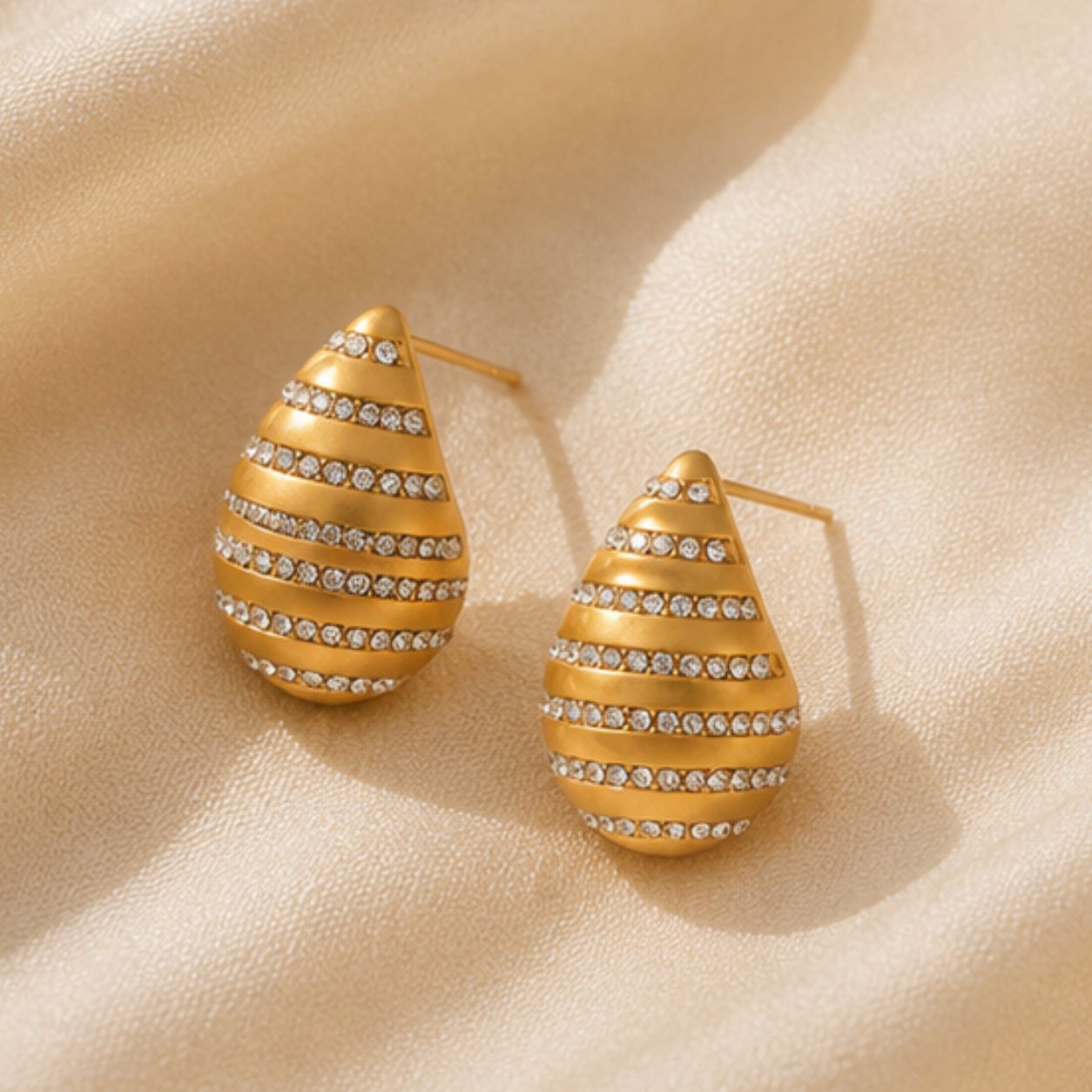 Naira Spiral Glow Drops